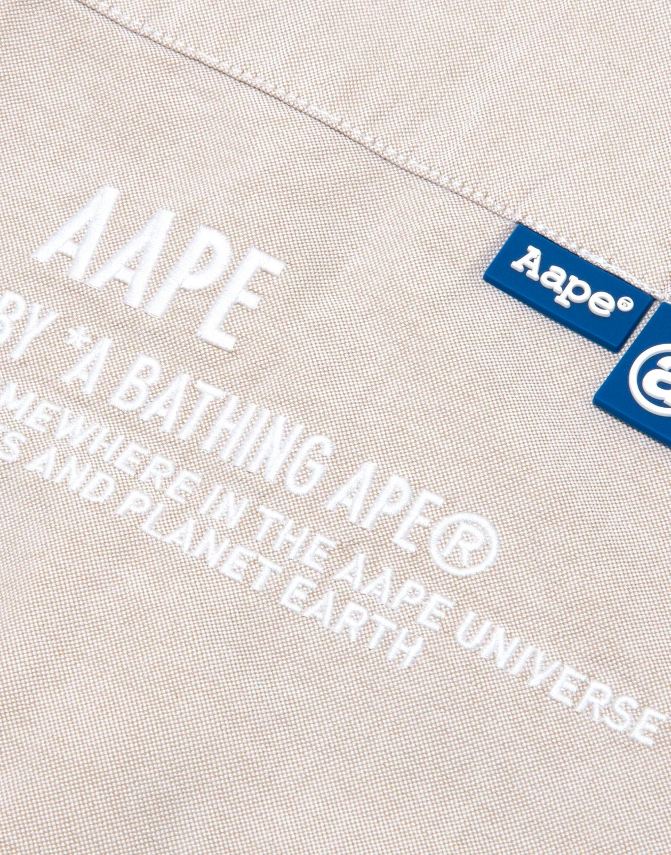 AAPE BY *A BATHING APE®️
camouflage-panel cotton shirt